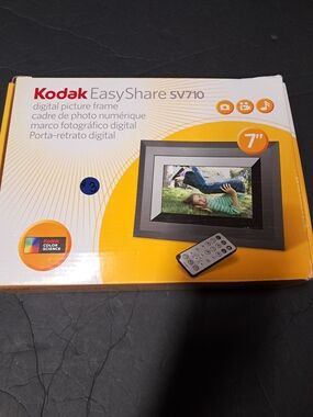 Kodak EasyShare SV710 digital picture frame in black and orange packaging